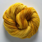 tonal golden yellow sock yarn -- extrafine merino