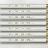 Gift set of pencils for knitters and crocheters saying "Eat. Sleep. Loop. Repeat."
