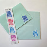 Sticker stamps in action adorning snail mail