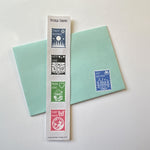 This postage stamp shaped sticker sheet strip includes Forest Blessings, Kitty Love, Mush Love, and Fairy Magic.