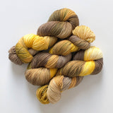 "Spicy Brown Mustard"  - Buy one skein or BUNDLE and save - DK Sock Yarn (merino/nylon light worsted weight) - Hand-dyed variegated in shades of mustard yellow and earthy brown