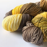 "Spicy Brown Mustard"  - Buy one skein or BUNDLE and save - DK Sock Yarn (merino/nylon light worsted weight) - Hand-dyed variegated in shades of mustard yellow and earthy brown
