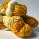 Bulky-weight chunky yarn in Creme Brulee - planned pooling / self-striping