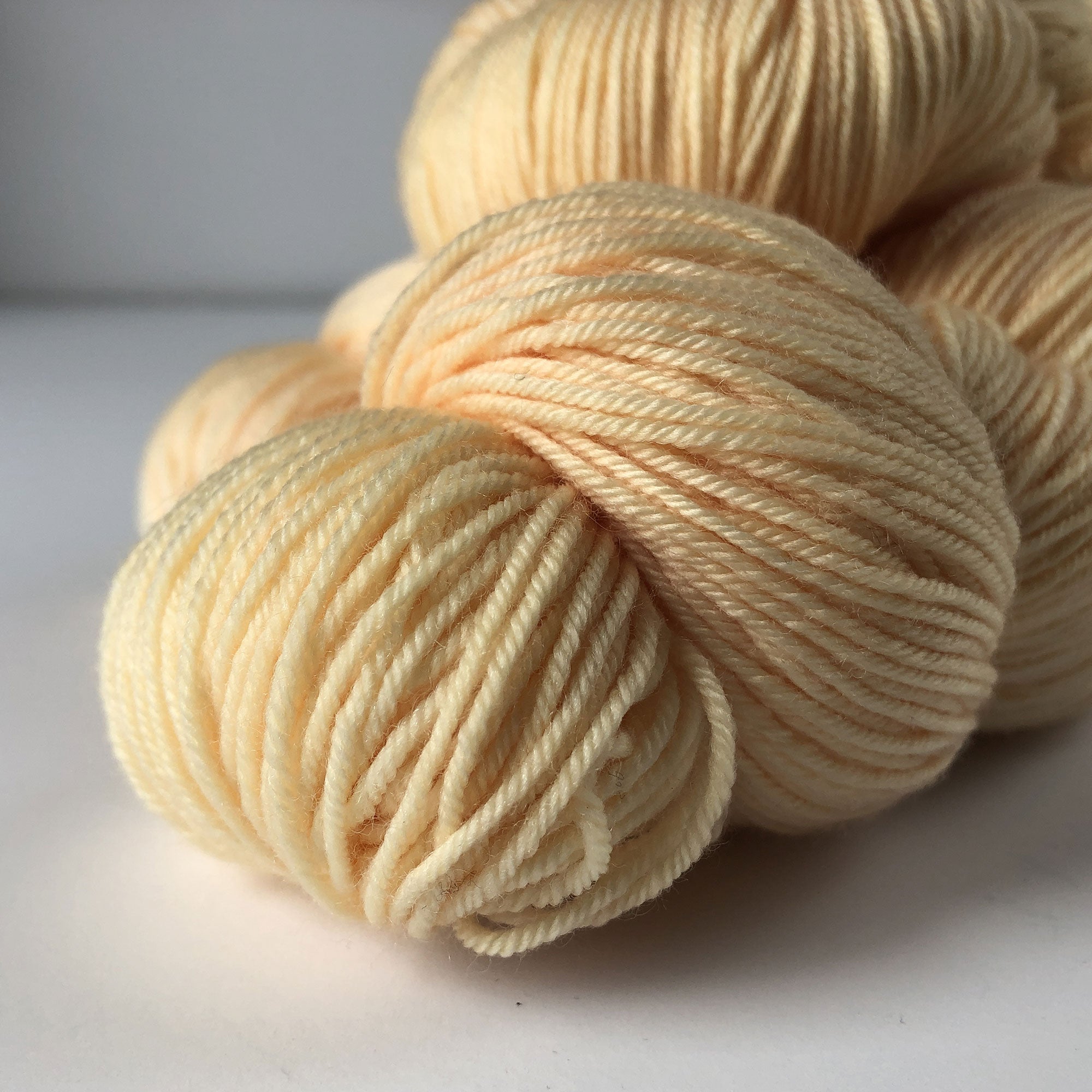 Mango cream sock yarn