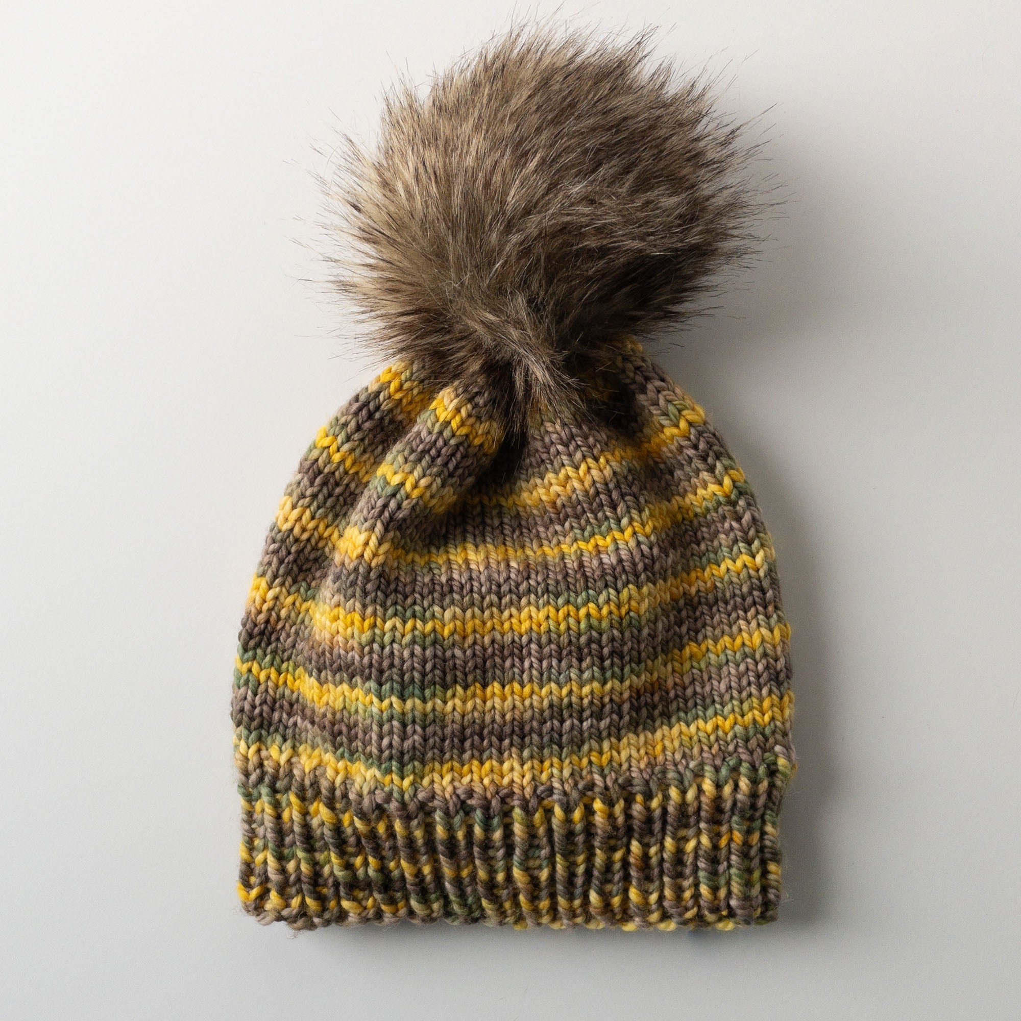 One skein of Spicy Brown Mustard, quick knitting, self-striping