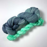 surf's up blue yarn plus a neon mint day-glo mojito mini skein