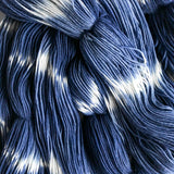 blue and white sock yarn close up