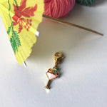 stitch marker and drink umbrella comes with the mini-skein set of five 