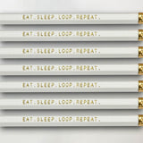 Gift set of pencils for knitters and crocheters saying "Eat. Sleep. Loop. Repeat."