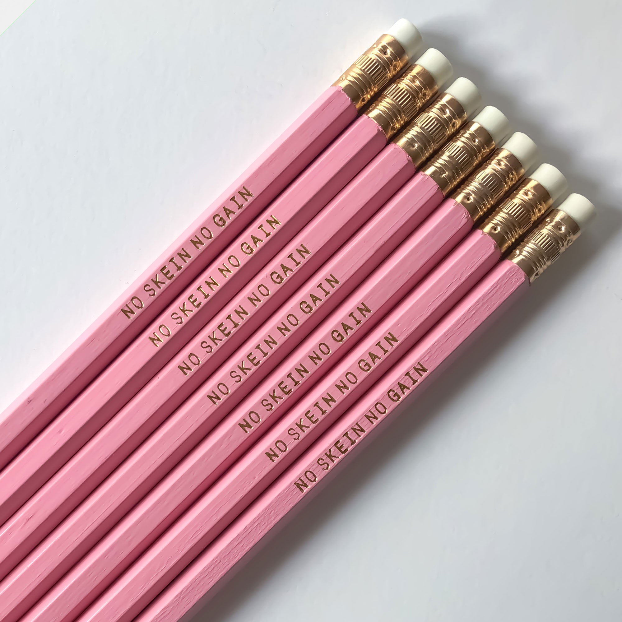 Yarn themed pencil set saying "just one more row" is perfect for knitting and crochet fans
