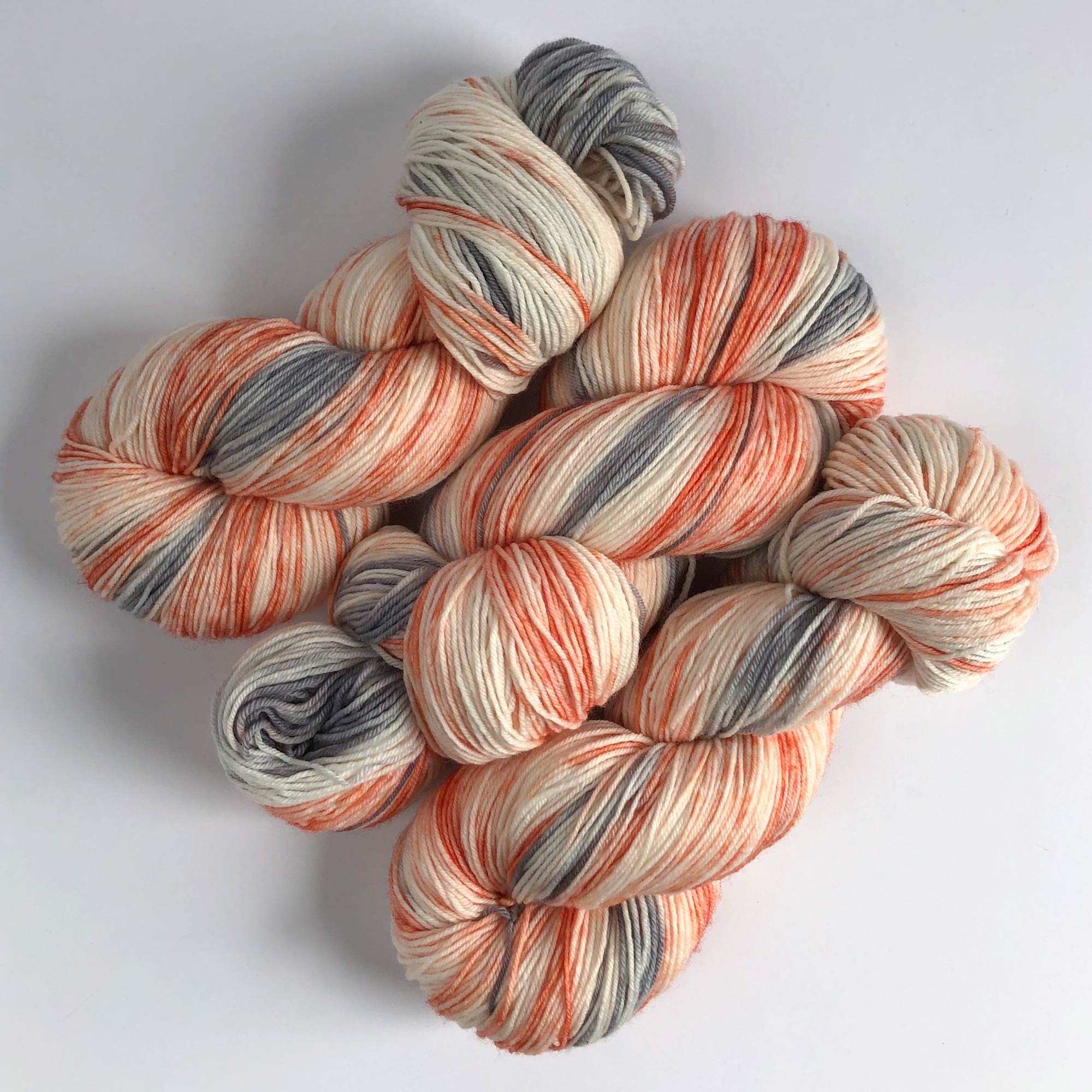 coral and grey gradient space dyed sock yarn