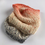 crocheted cowl with space dyed coral to gray sock yarn 