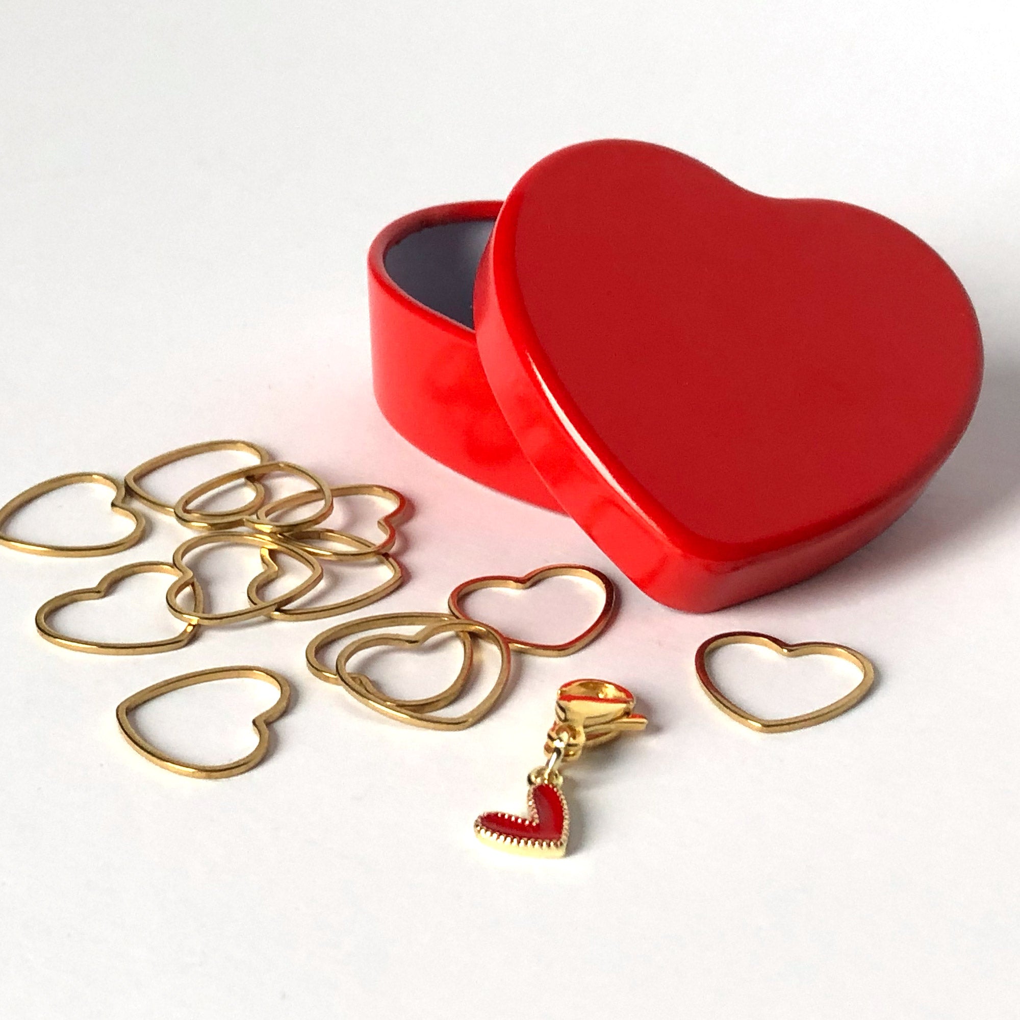 Precious Metal Stitch Marker Set with Gold-shaped hearts and enameled 16K gold charm