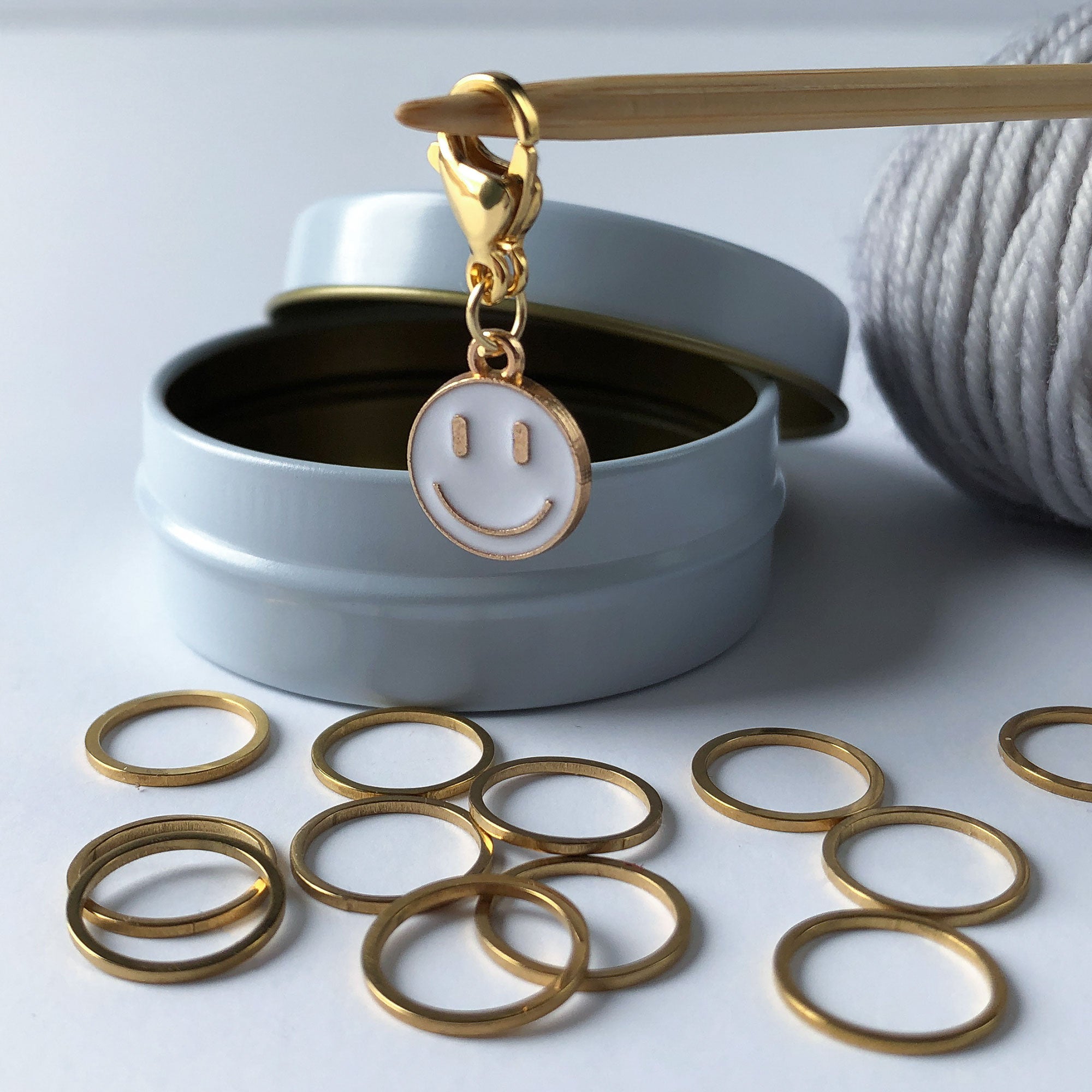 snagless gold ring stitch markers with lobster clasp enameled smiley face progress keeper charm
