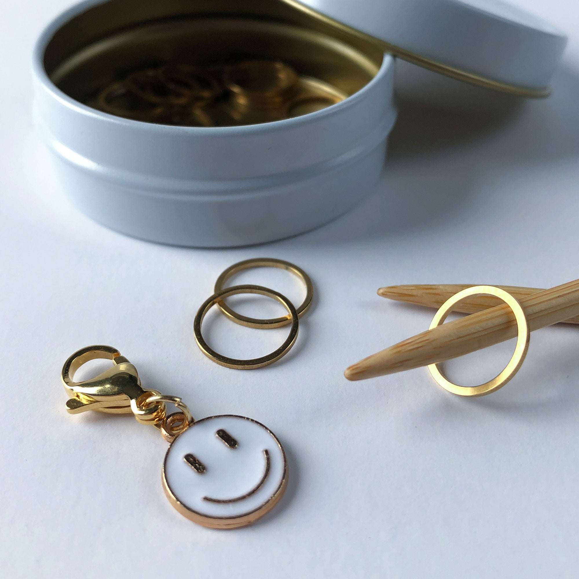 Fun and practical metal stitch marker set is a great knitter gift 