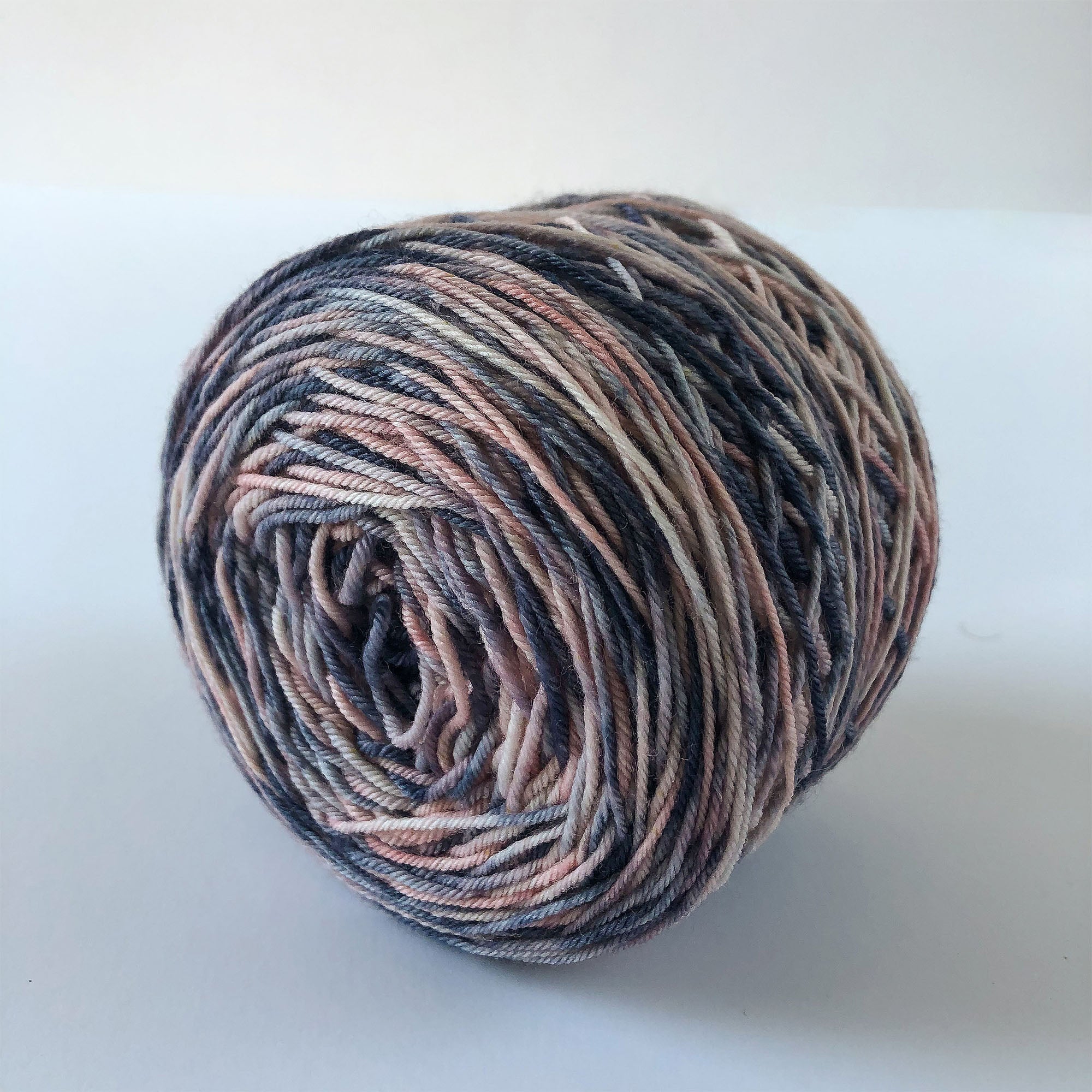 hand dyed and caked pink and blue sock yarn 