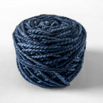 hand dyed blue bulky yarn caked up