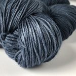 close-up of hand dyed tonal sock yarn from global backyard