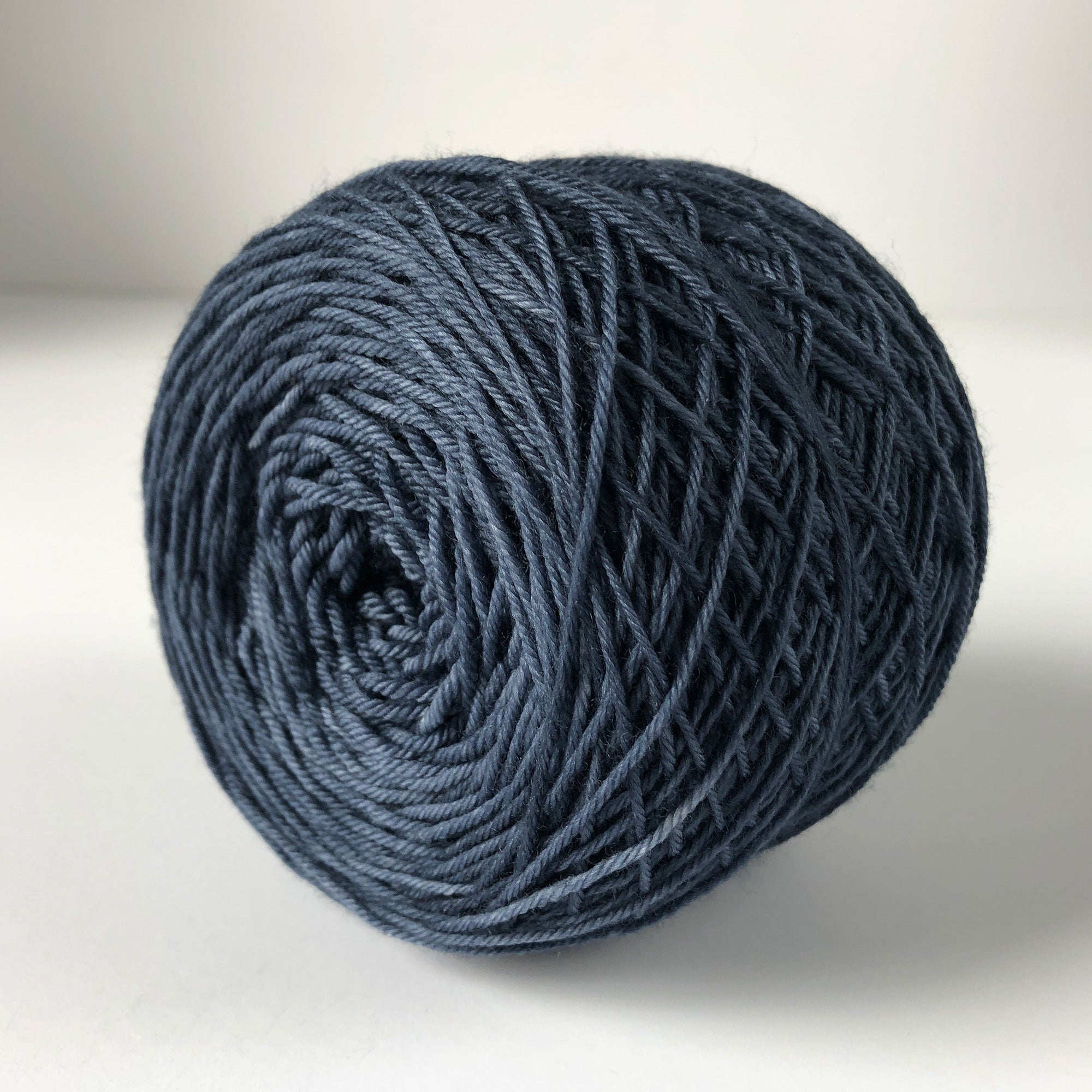 caked navy blue tonal "quarter to midnight" sock yarn 